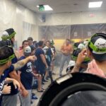 Shohei Ohtani’s interpreter Will Ireton & Dodgers trainers on Slip ‘N Slide for NL West celebration